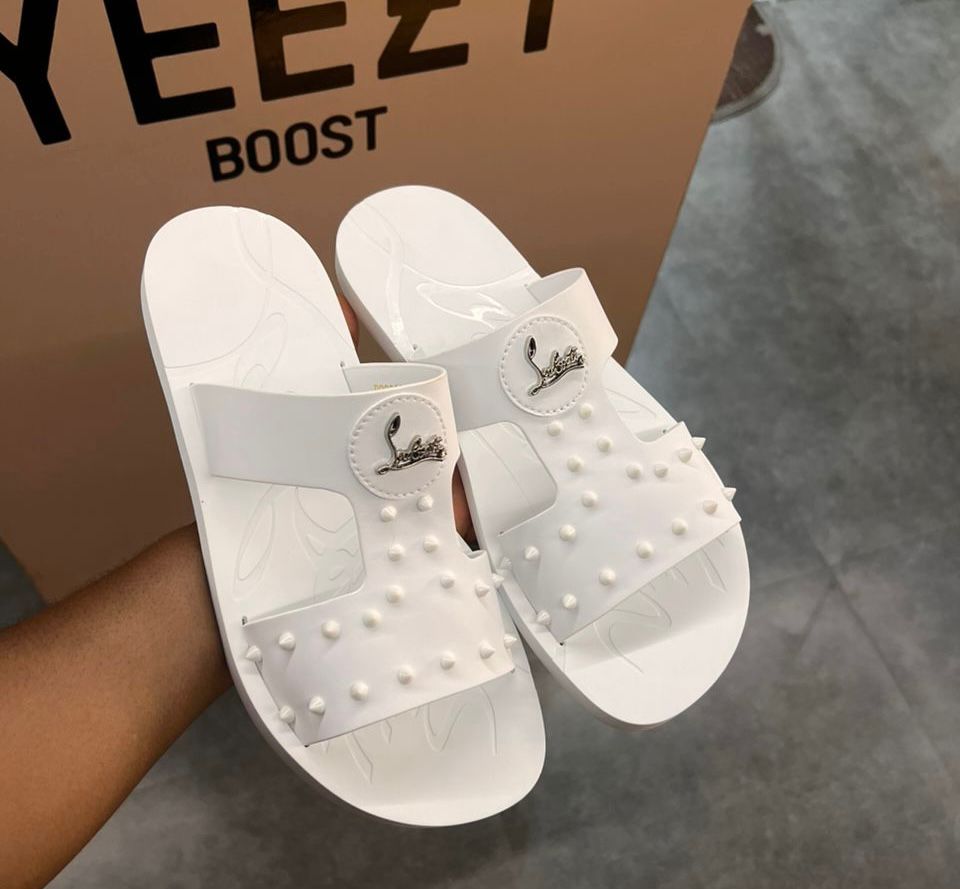 Christian Louboutin white Spiked Logo Slides Christian Louboutin Black Spiked Logo Slides
