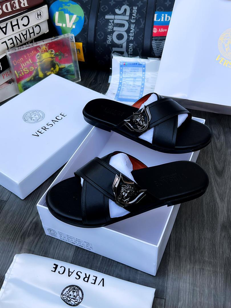 Versace black leather cross strap sandals Versace black leather cross strap sandals